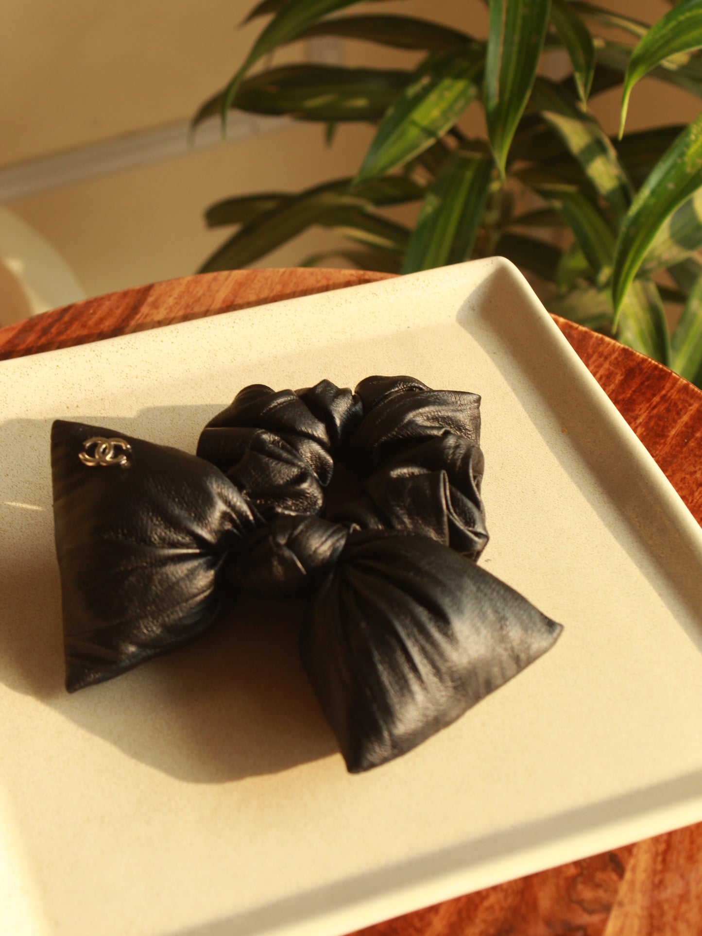 BLACK LEATHER BOW SCRUNCHIES