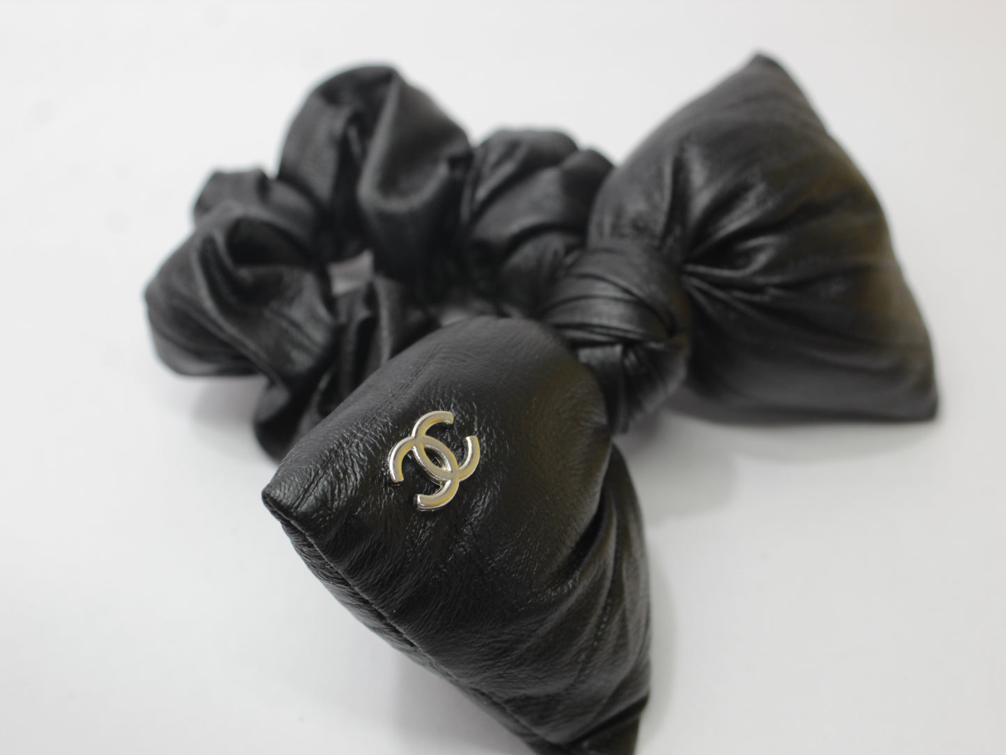 BLACK LEATHER BOW SCRUNCHIES